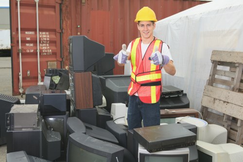 House clearance team removing furniture from a home in Muswell Hill