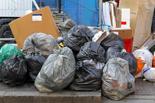 Workers sorting items during house clearance in Muswell Hill
